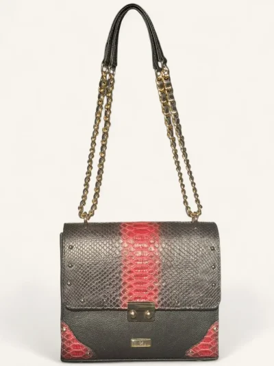 Bolsa para dama tipo cross-body en piel de pitón color negro y rojo con cadena mediana frente